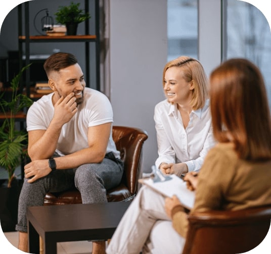 Dental patients and dentist discussing the cost of dental emergencies