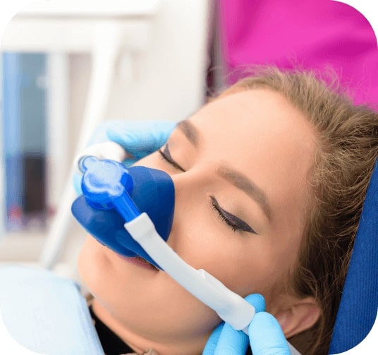 Woman receiving oral conscious dental sedation